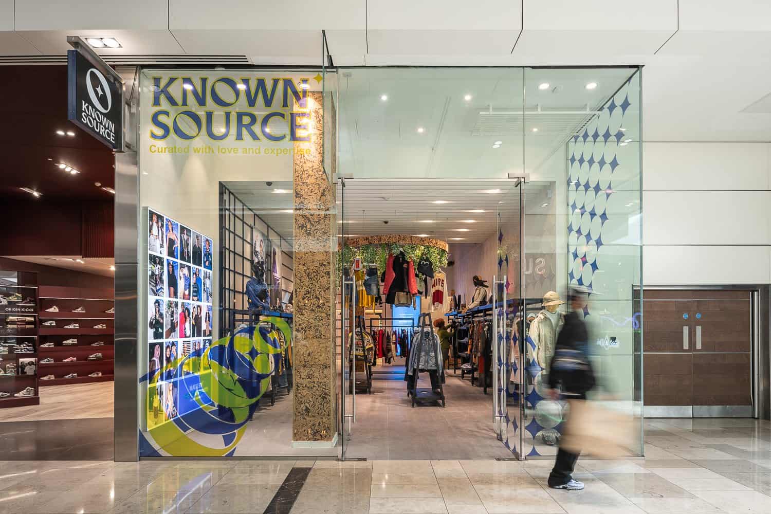 Known Source retail shopfront and glazed entrance at Westfield Stratford, fitted out by OLLYWOOD